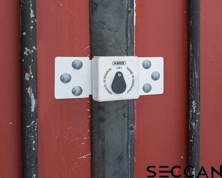 An ABUS Diskus container lock securing a red shipping container, featuring the Seccan brand name.