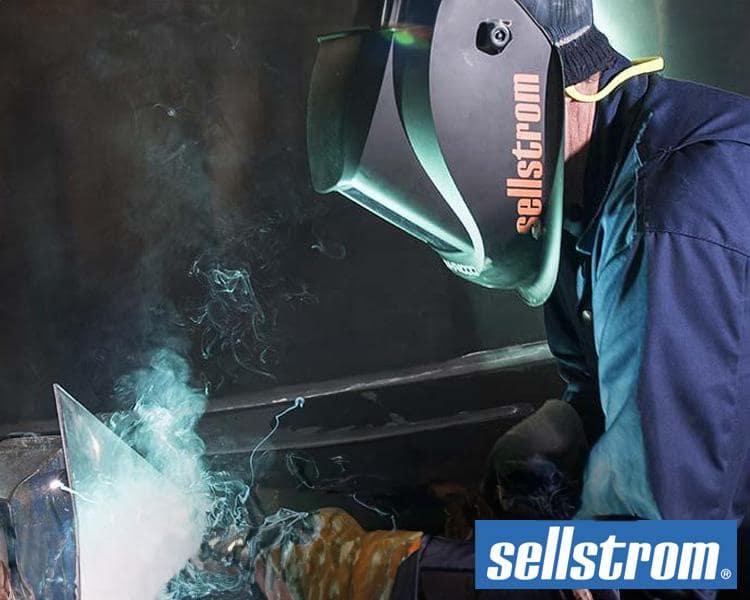 Welder welding wearing Sellstrom PPE, ensuring maximum protection