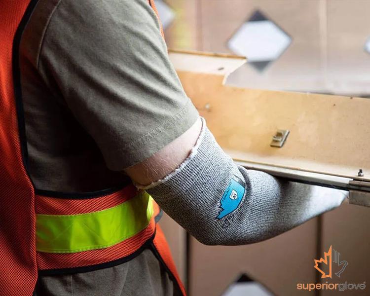 Superior Glove impact-resistant gloves displayed on a workbench, showcasing their robust design for industrial use.