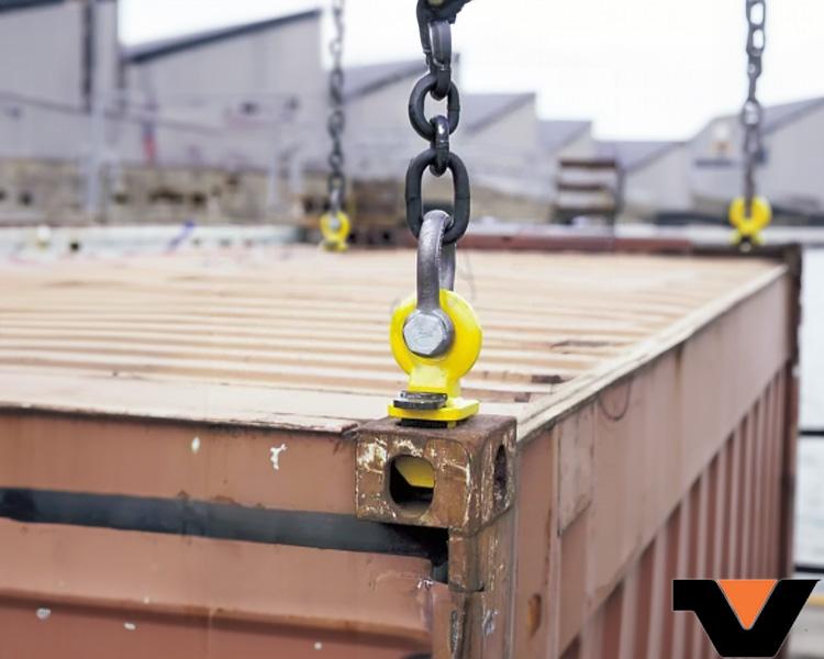 eye bolts securing a shipping container ready to be lifted out of the port